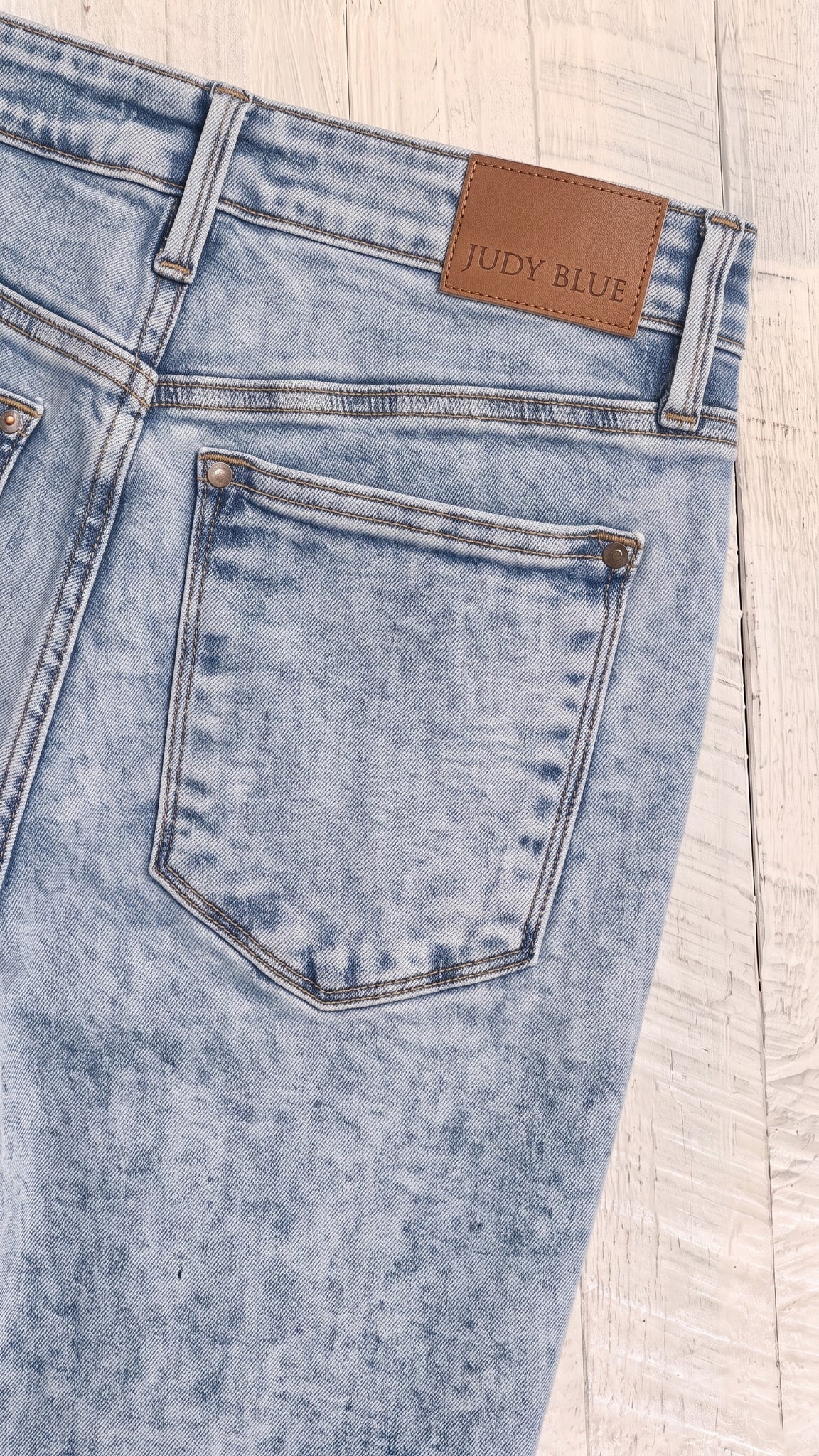 High Waist Stone Wash Straight Fit — Back pocket detail