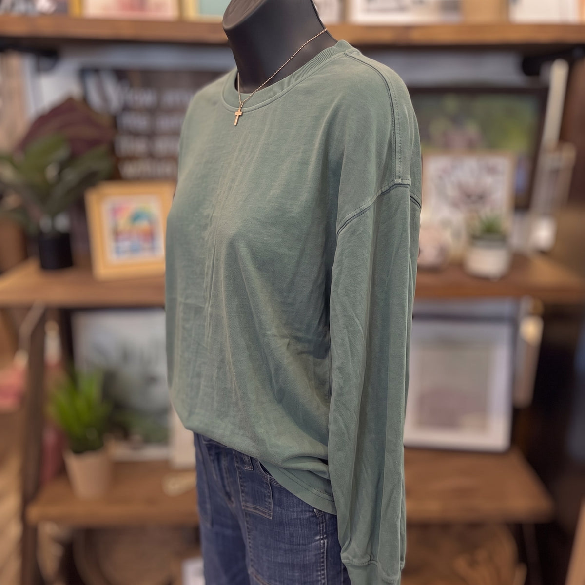 Washed Crew Neck Long Sleeve Knit Top | Dusty Green — Angled view on mannequin