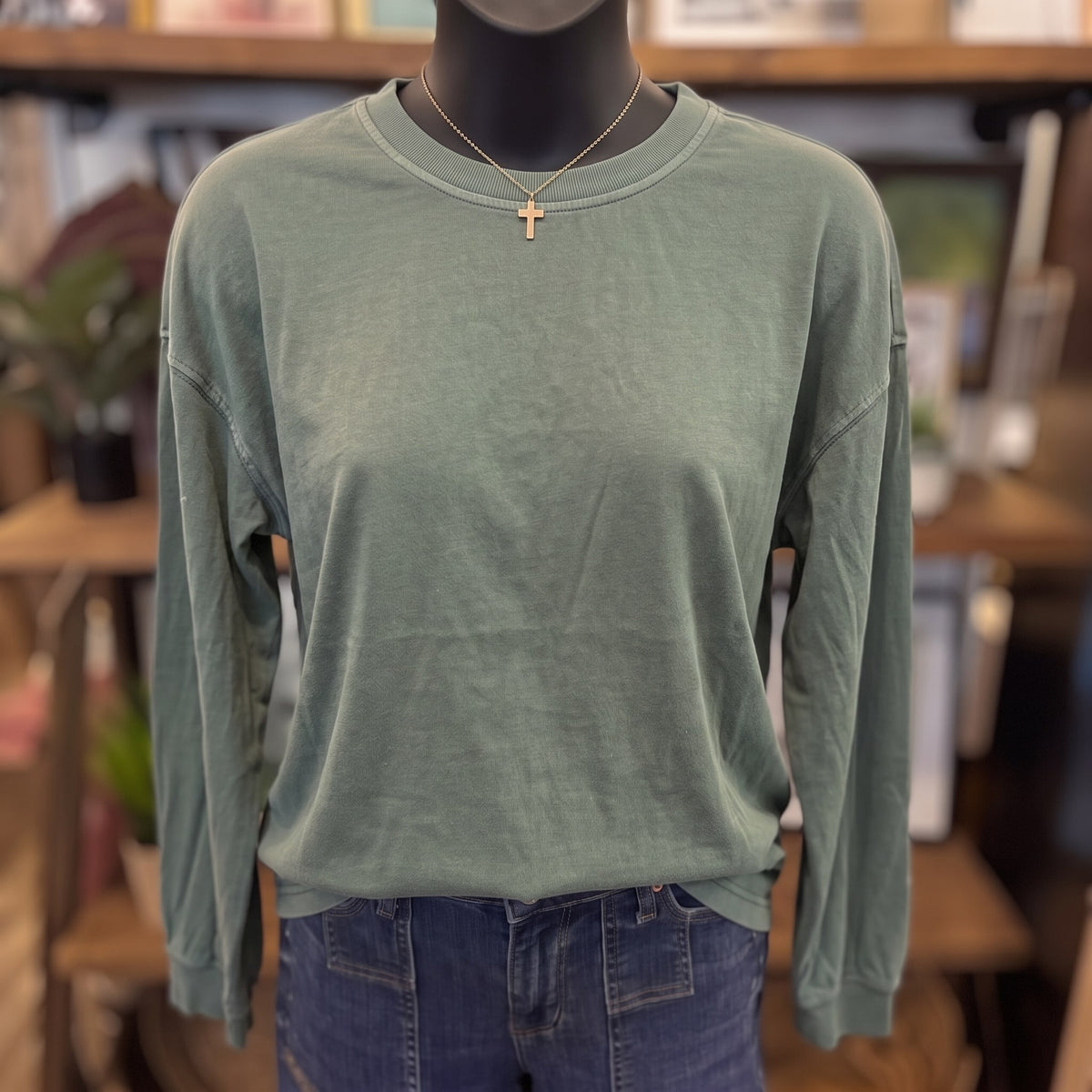 Washed Crew Neck Long Sleeve Knit Top | Dusty Green — Front view on mannequin