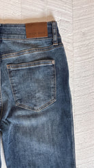 Judy Blue Petite Flare Jeans | Medium Wash — Back pocket detail