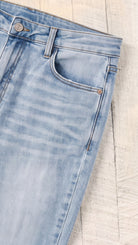 High Waist Tummy Control Vintage Wash Side Slit Slim Boot — Front pocket detail