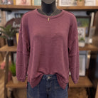 Exposed Seam Detail Long Sleeve Knit Top | Maroon — Front view on mannequin