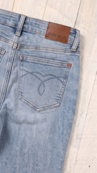 Judy Blue Mid Rise Rigid Magic Straight | Medium Wash — Back pocket detail