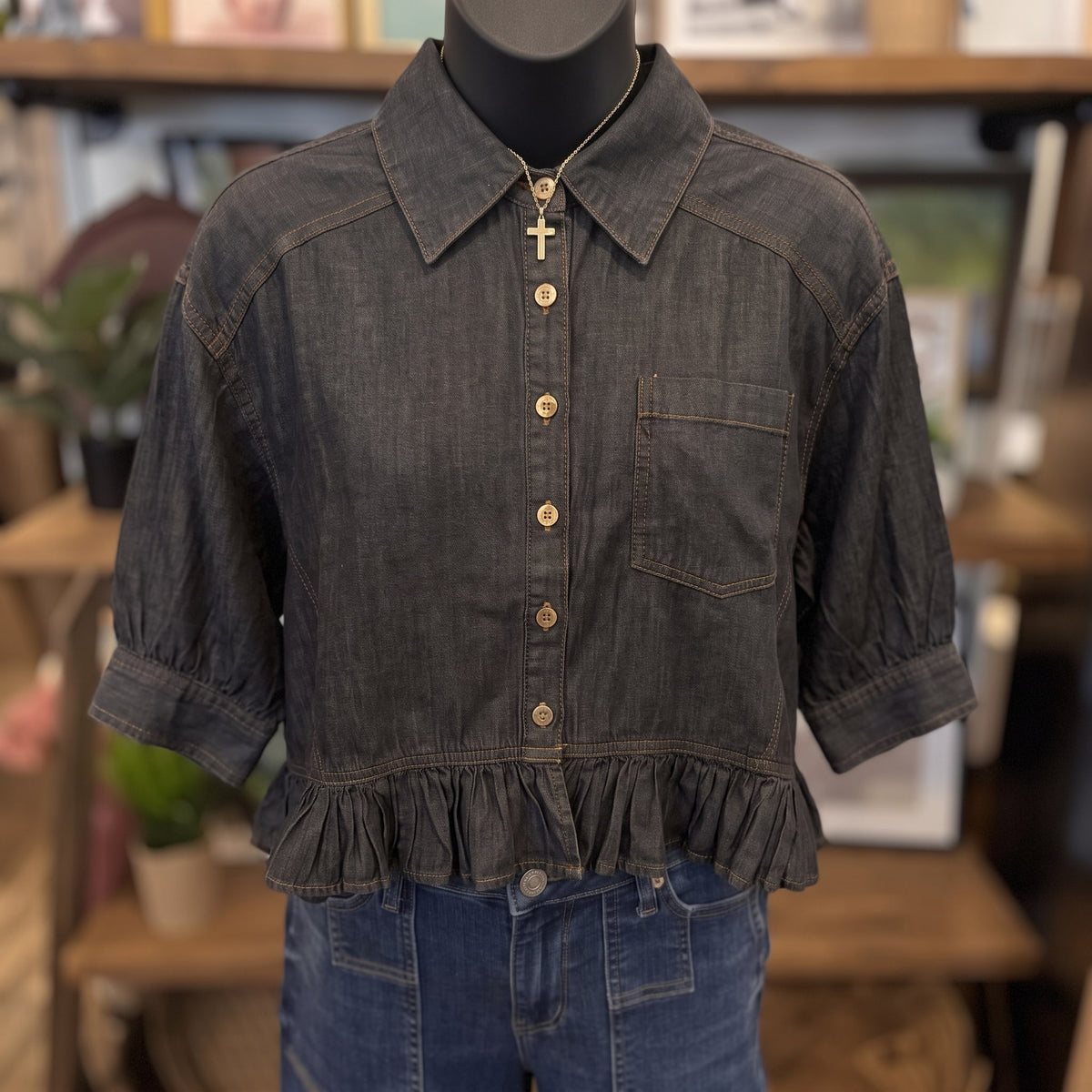 Button Down Ruffled Hem Blouse | Black Denim — Front view on mannequin