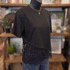 Floral Lace Trimmed Asymmetrical T-Shirt | Black — Angled view on mannequin