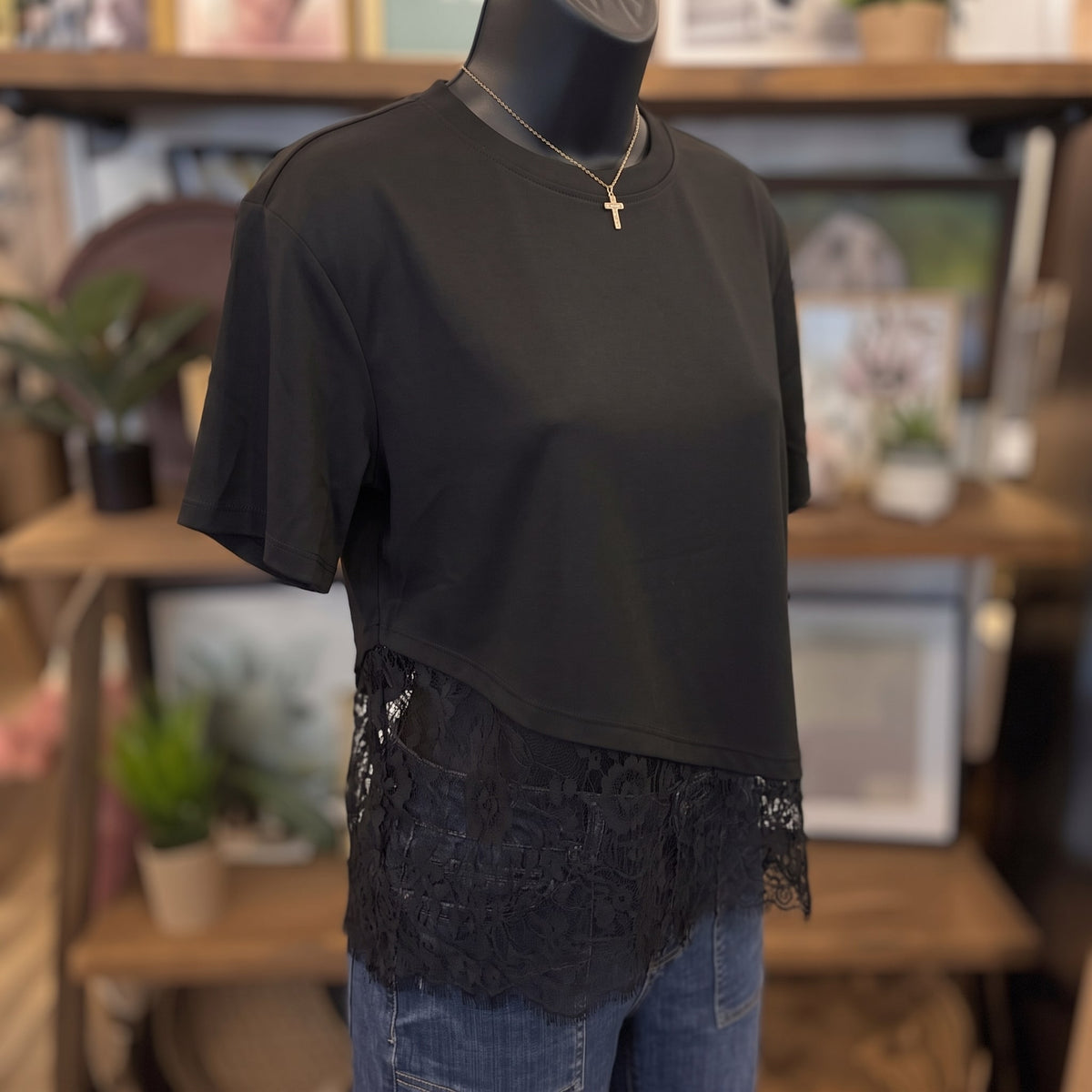 Floral Lace Trimmed Asymmetrical T-Shirt | Black — Angled view on mannequin